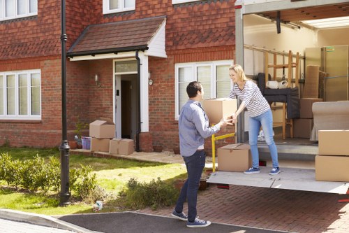 House moving team working in a St Johns Wood residential street
