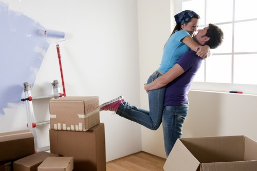 Staff performing a risk assessment before moving items