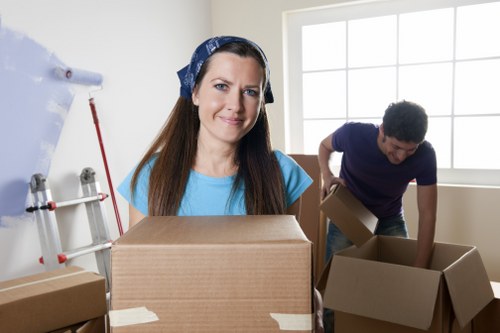 Packed boxes and furniture ready for transport in a St Johns Wood flat
