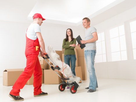Team organising office relocation items for a business move