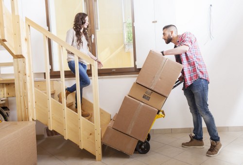Local removal truck loading furniture in St Johns Wood