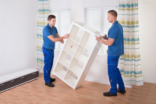 Household moving boxes and furniture ready for removal in St Johns Wood
