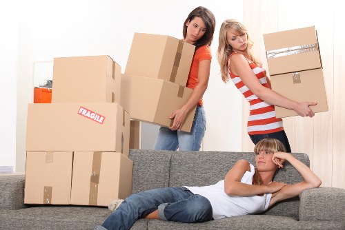 Professional moving van loading furniture and boxes